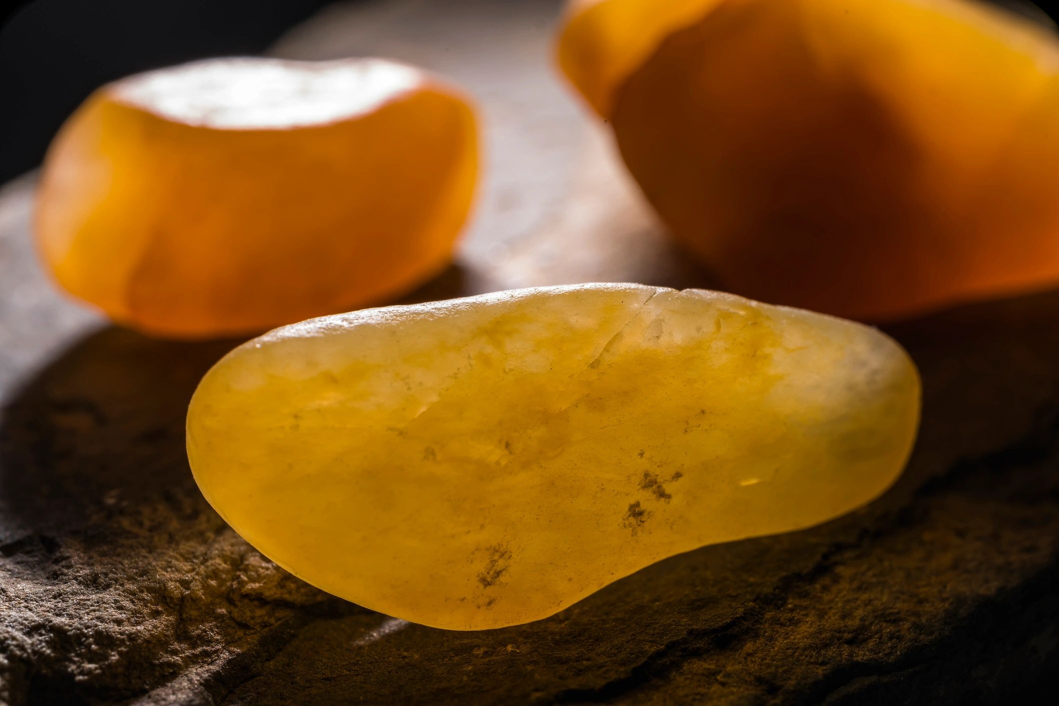 rough yellow jade stone natural uncut jewelry photography